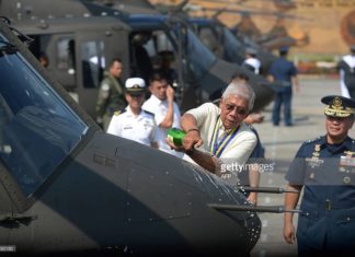 Newest Philippine Air Force Helicopters A Philippine Air Force chaplain blesses a newly-delivered Bell 412 helicopter with holy water during a christening ceremony in Manila on August 17, 2015