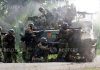 Foto Foto Darurat Militer Aceh 2003-2004, Operasi Militer Lawan GAM TNI melayani kontak tembak dengan Gerakan Aceh Merdeka, 2003